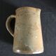 Set of 2 enamelled stoneware jugs