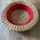 Rattan basket with red trim
