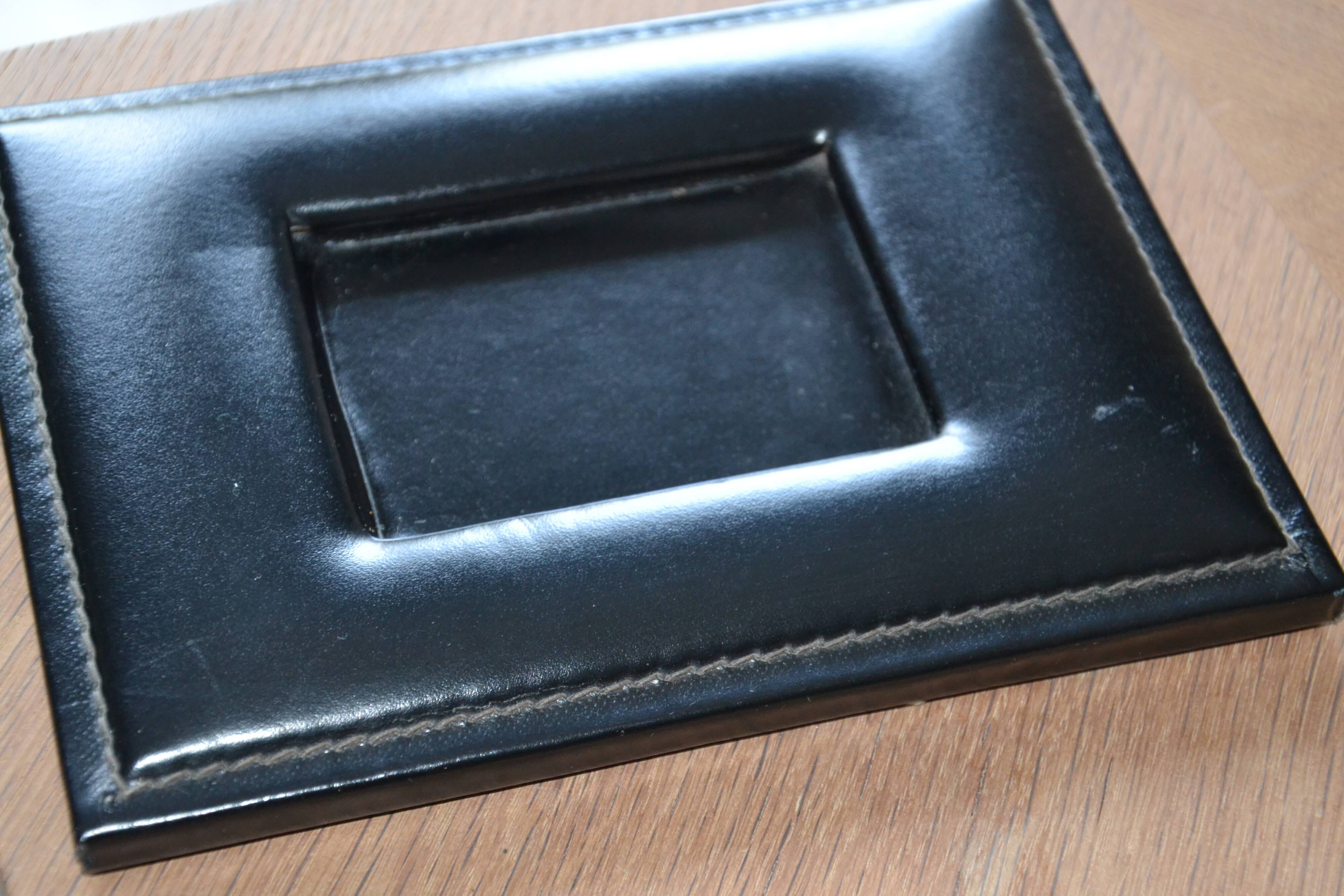 Antique crystal ashtray with its leather stand