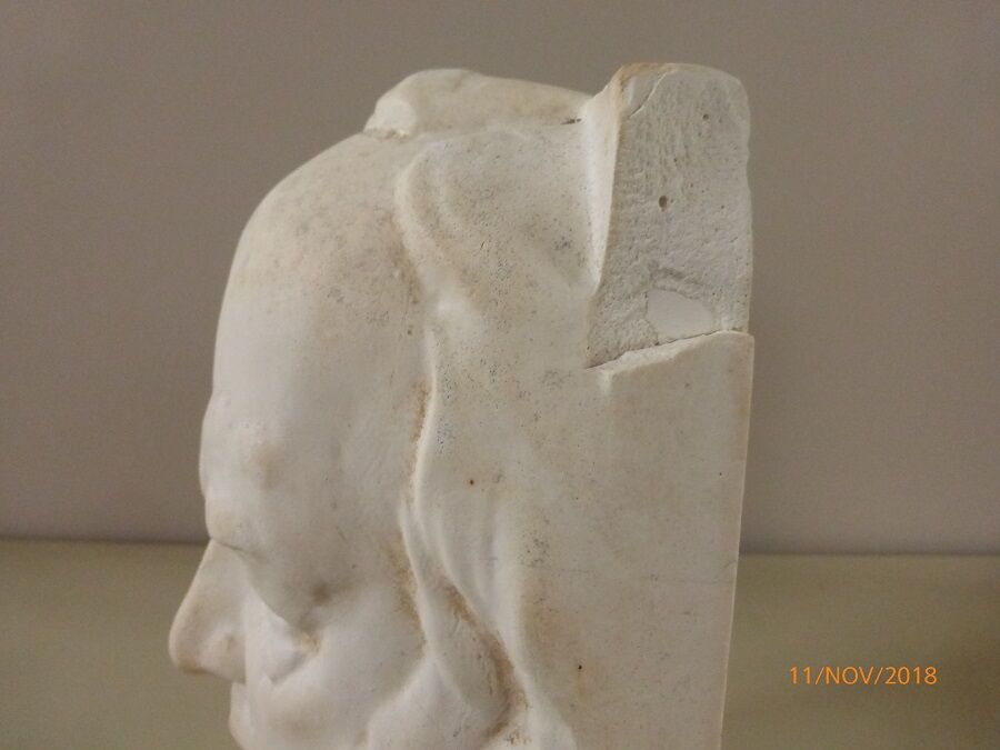 Pair of bookends in plaster