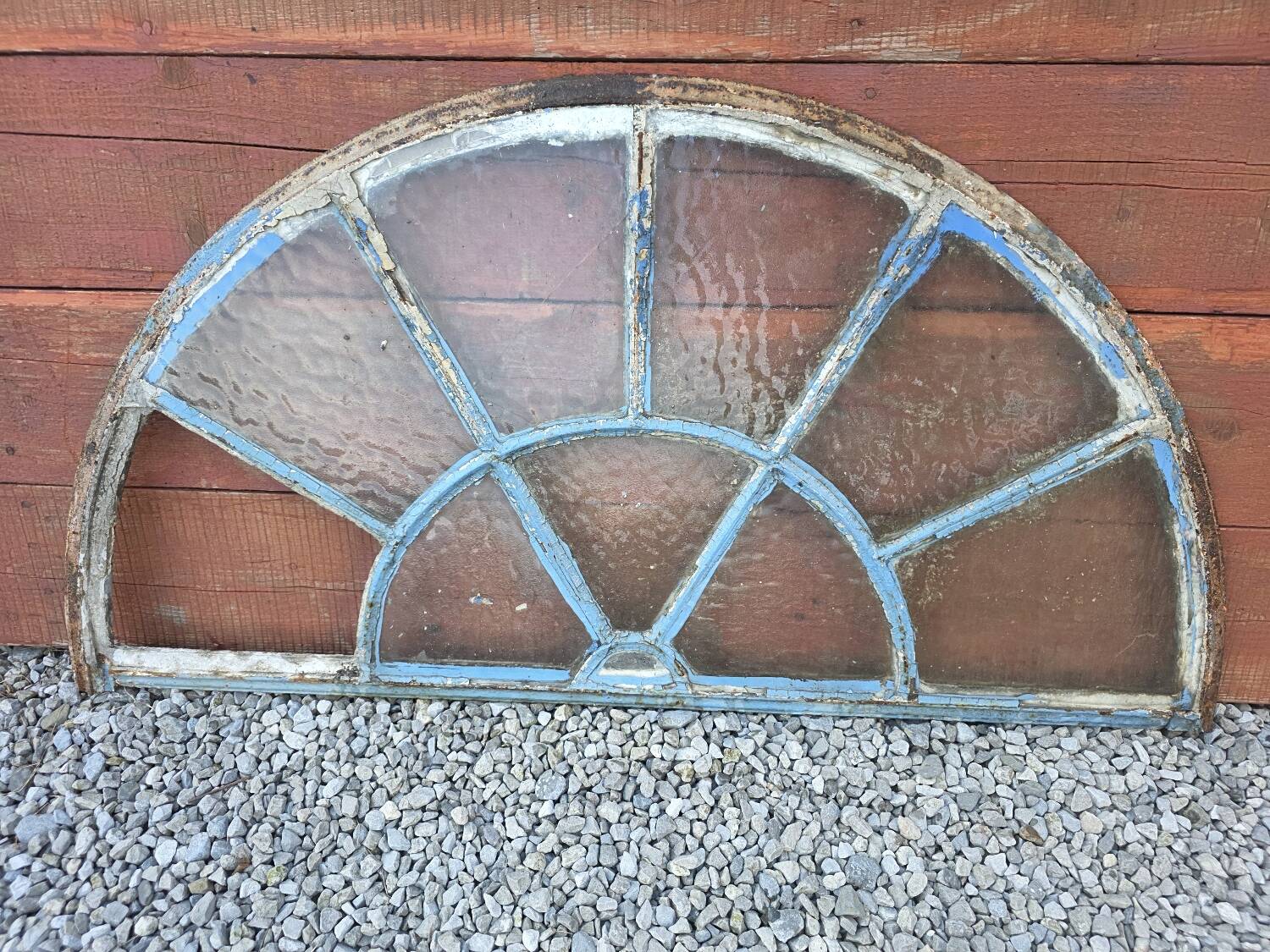 Old wrought iron full riveted gates from the 19th century.