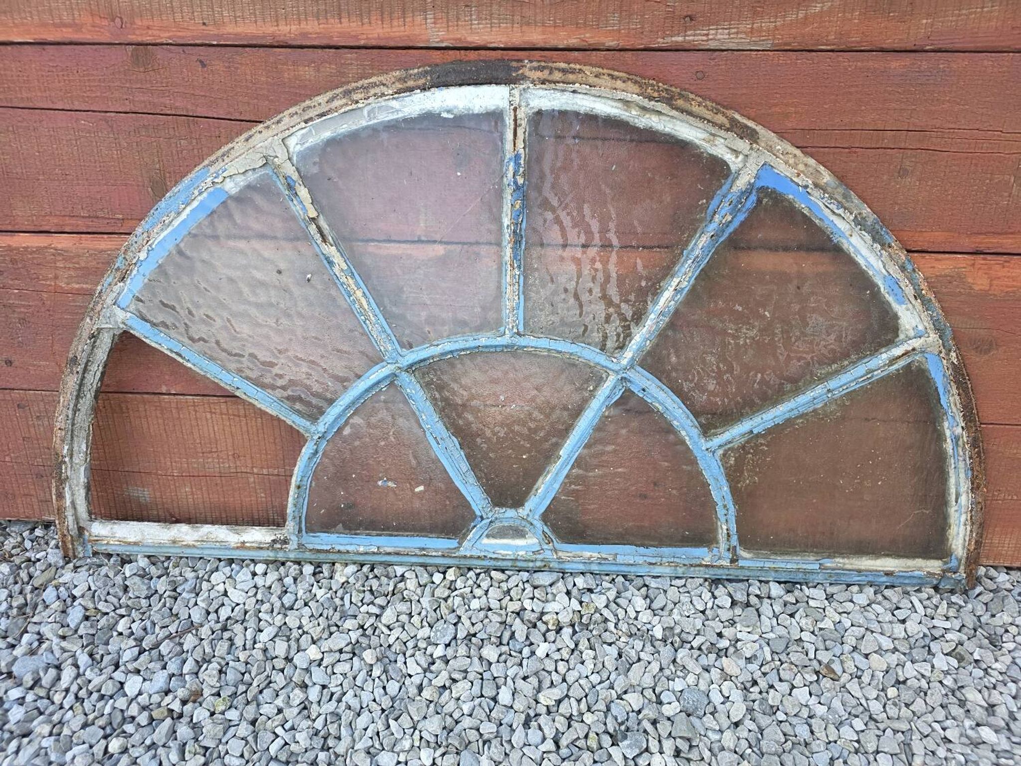 Old wrought iron full riveted gates from the 19th century.