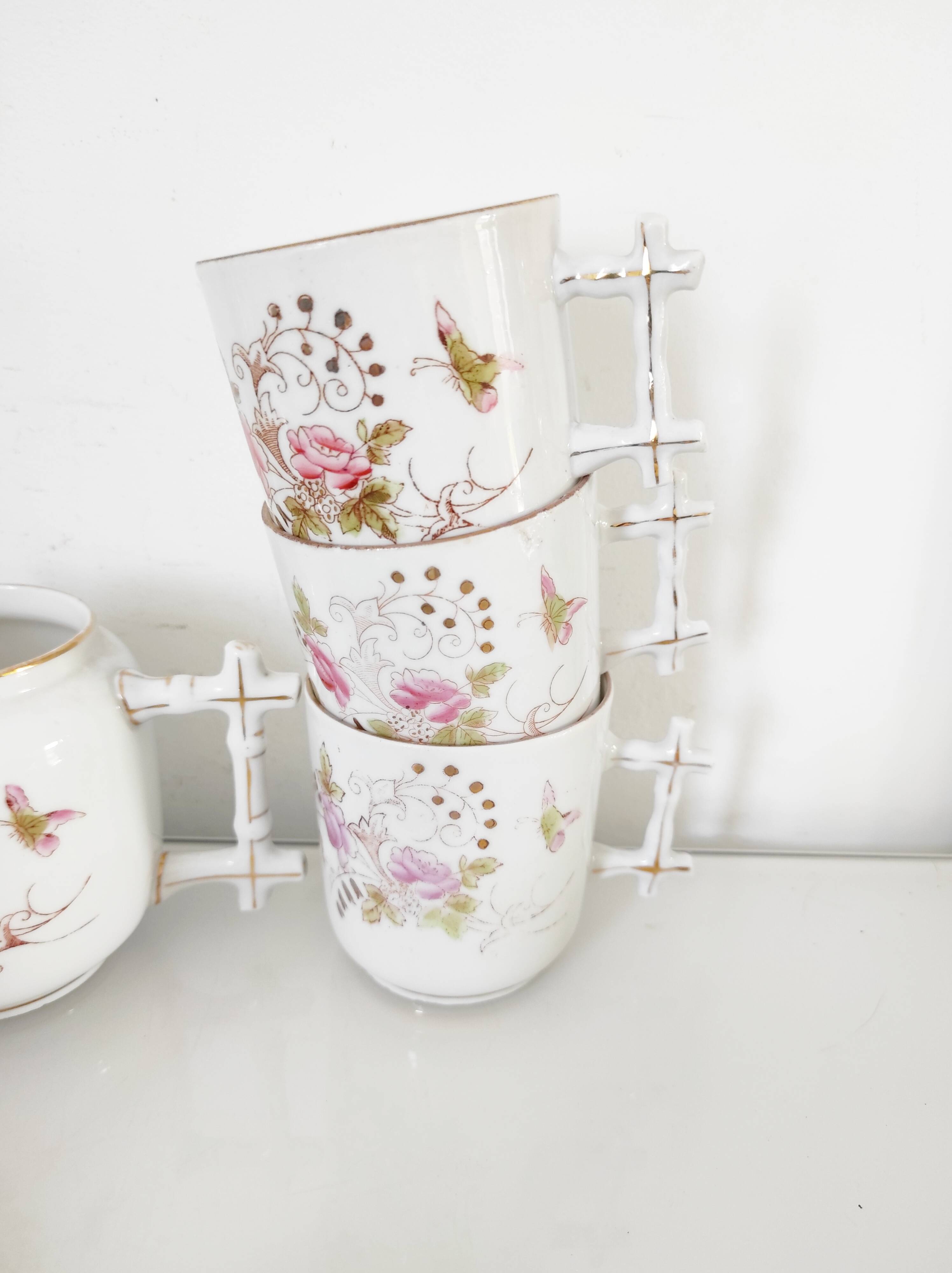 Porcelain coffee service for 8 people with bamboo handles.