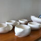 Teapot and cups in contemporary ceramic
