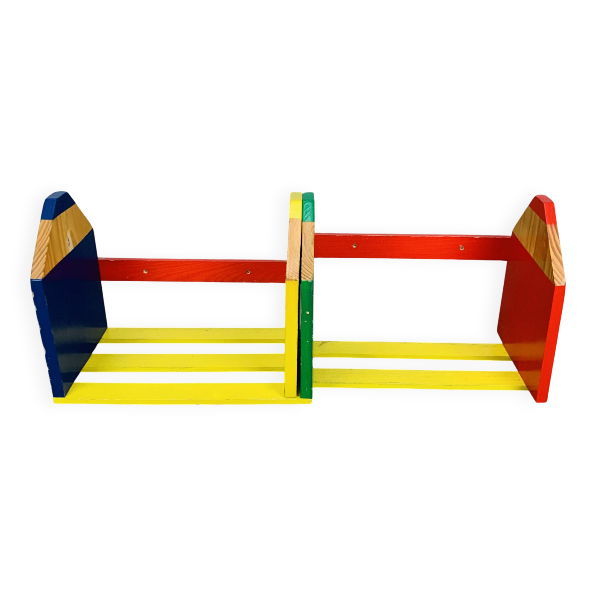 Modular wall-mounted pencil shelf in Pierre Sala style, for children.