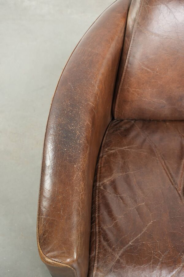 Fauteuil design aviateur en cuir de vache marron cognac foncé robuste