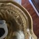 Vintage table lamp with a bronze base and moulded glass globe.