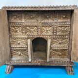 Travel cabinet with multiple drawers in carved wood early 20 th