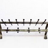 Metal wall coat rack