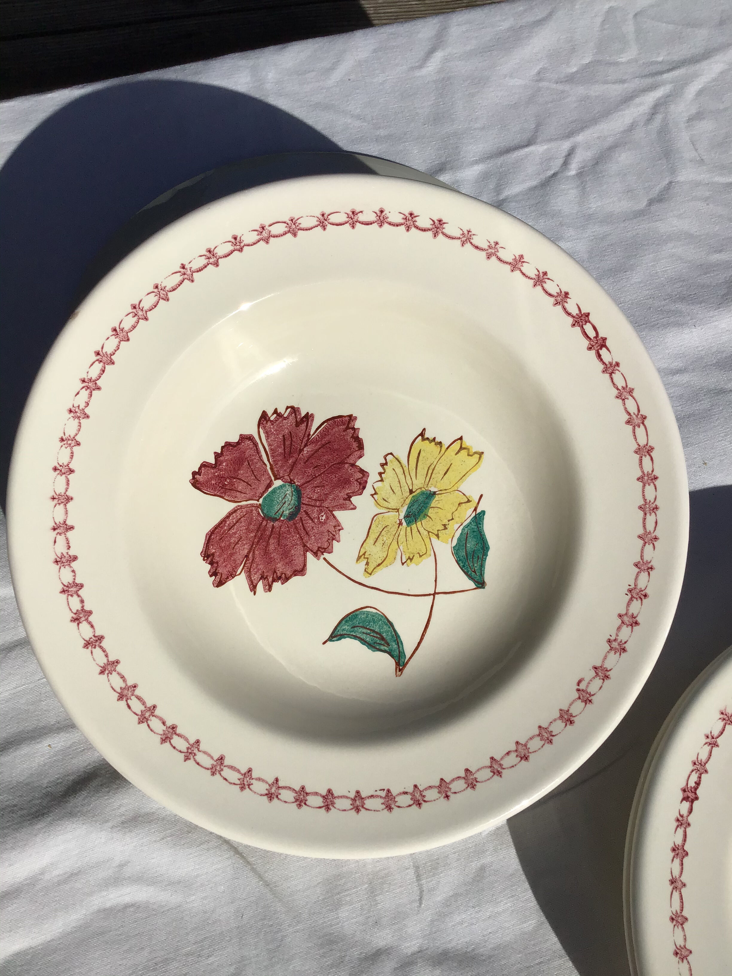 8 hollow plates burgundy and yellow flowers