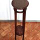 Antique high wooden pedestal with mahogany patina, circa 1900-1925.