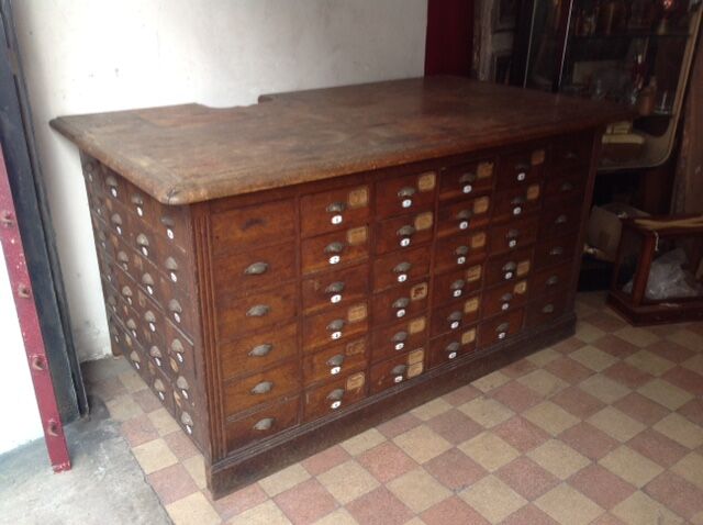 Craft furniture with small oak drawers in late 19th century
