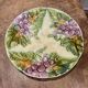 Assiette ancienne en barbotine