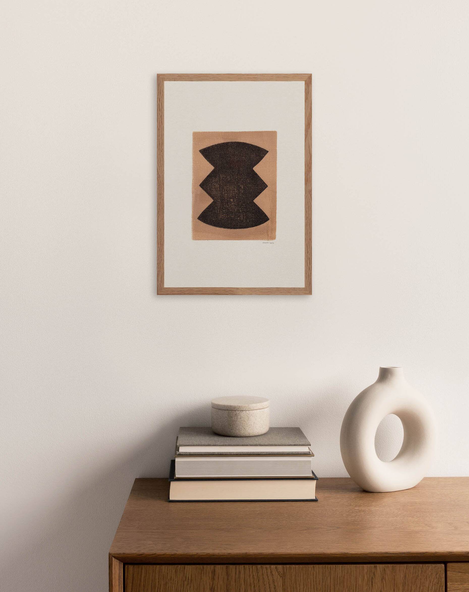 Abstract painting on framed paper signed Eawy in brown and black.