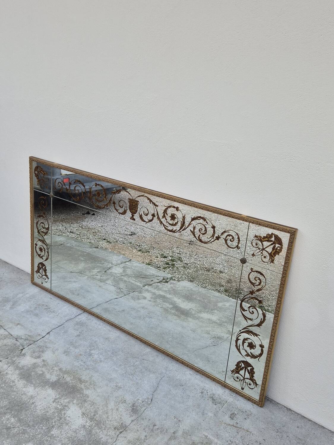 Antique gilded Venetian brasserie mirror in eglomised glass