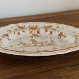 Signed Moustiers plate, in yellow shades