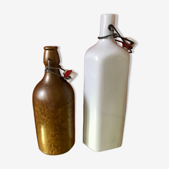 Set of 2 old enameled hot water bottles and stoneware bottles, vases, soliflores