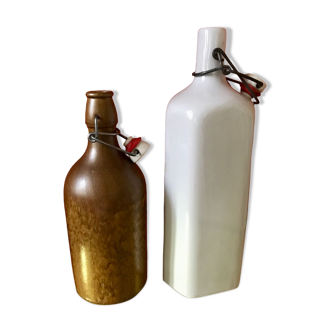 Set of 2 old enameled hot water bottles and stoneware bottles, vases, soliflores
