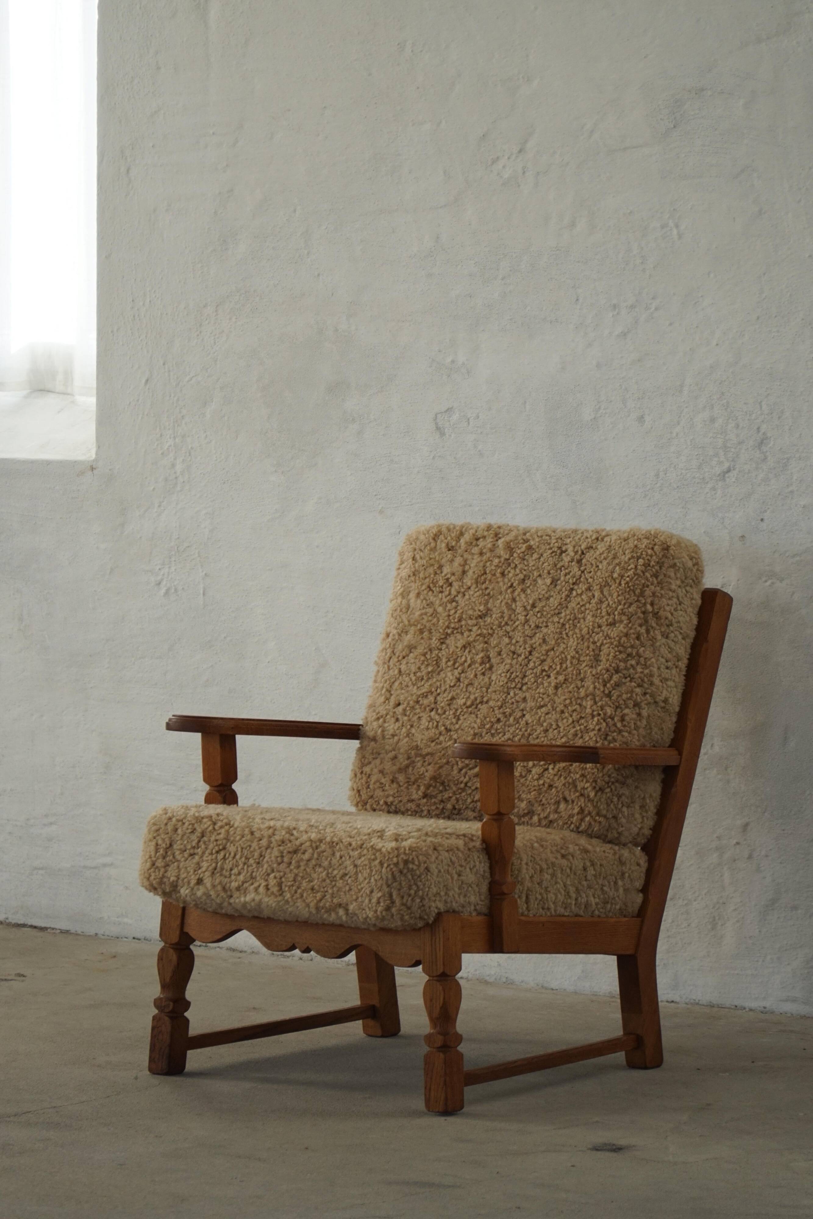 Danish modernist lounge chair in oak and lambswool, Henning Kjærnulf, 1960s
