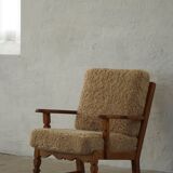 Danish modernist lounge chair in oak and lambswool, Henning Kjærnulf, 1960s