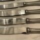 12 stainless steel knives. vintage