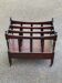 Vintage 19th-century Canterbury magazine rack made of solid wood.