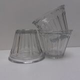 Old flared jam jar in moulded glass
