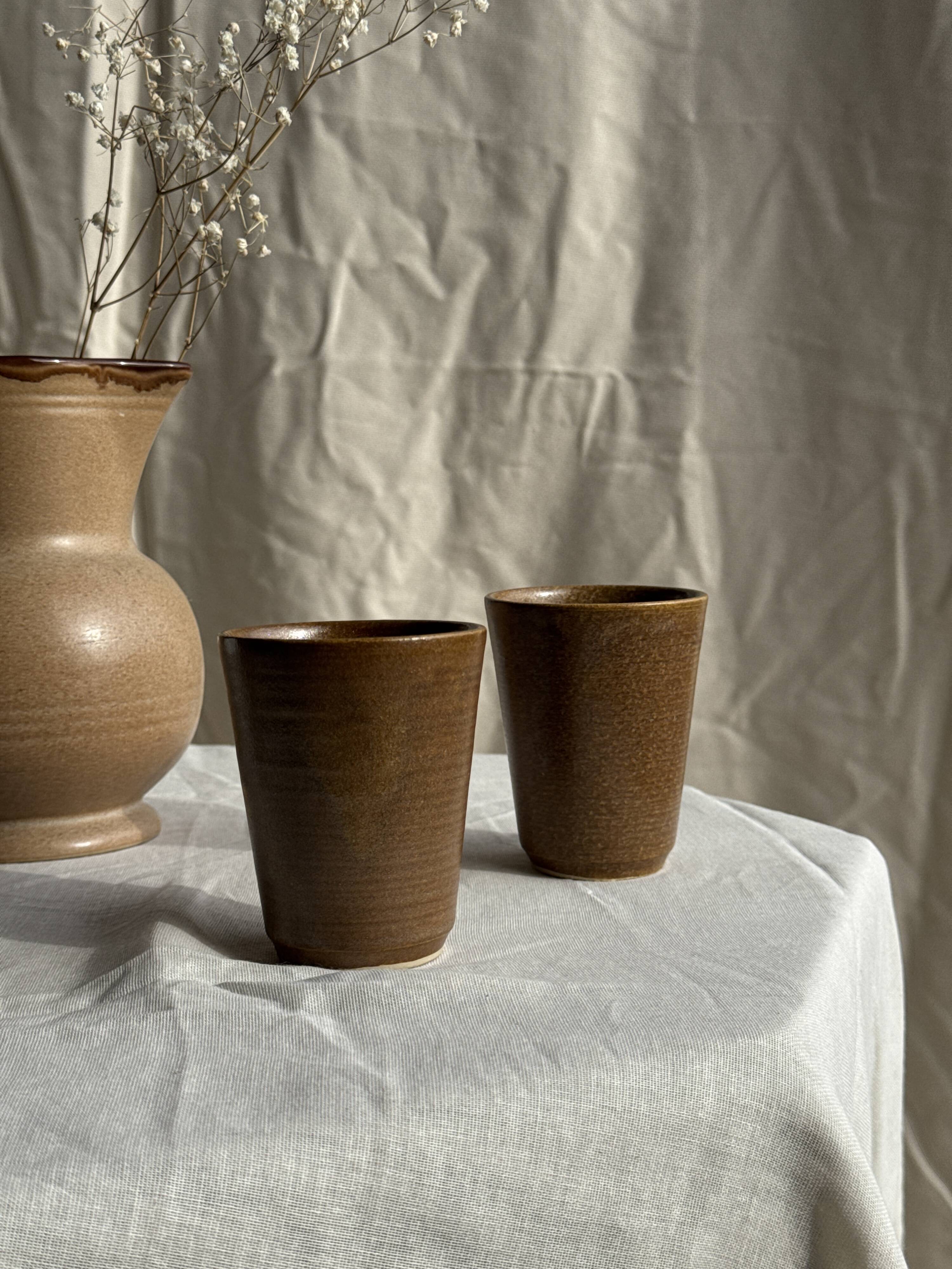 Set of 10 small stoneware mugs from Digoin.