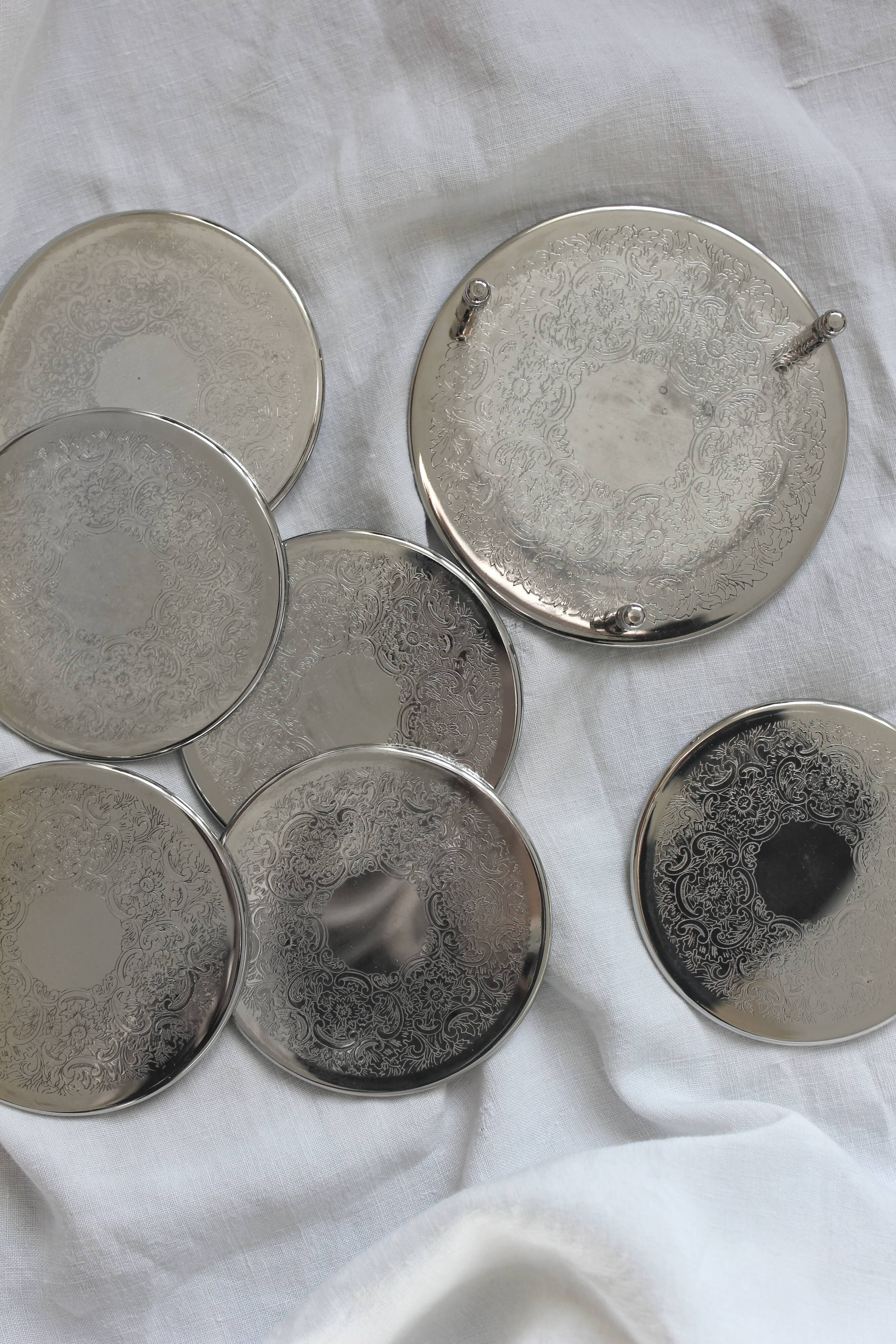 6 vintage chiseled silver metal coasters