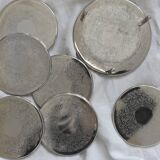 6 vintage chiseled silver metal coasters
