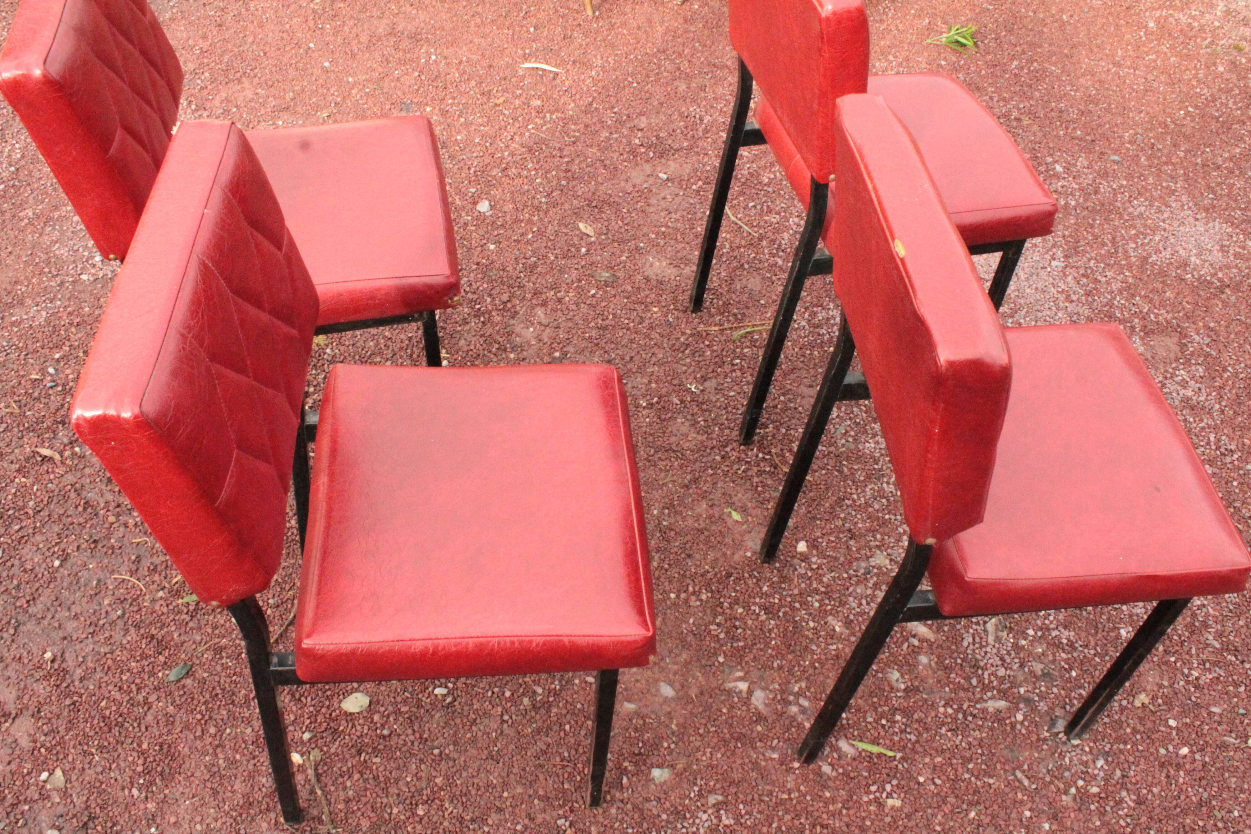 Series of 4 red chairs in skai 50s
