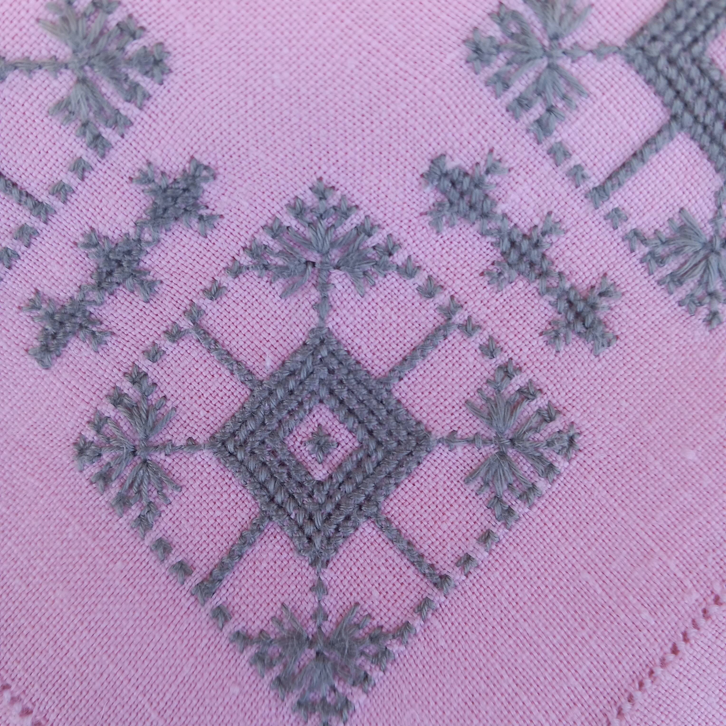 Large vintage linen tablecloth embroidered in pink and 12 matching napkins.