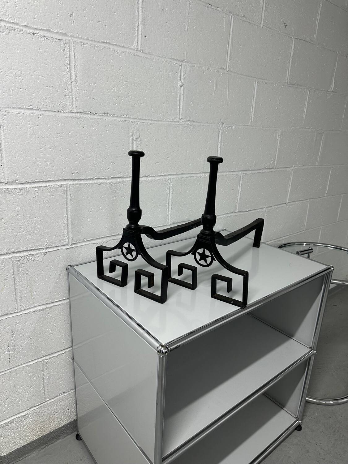 Pair of designer cast iron andirons