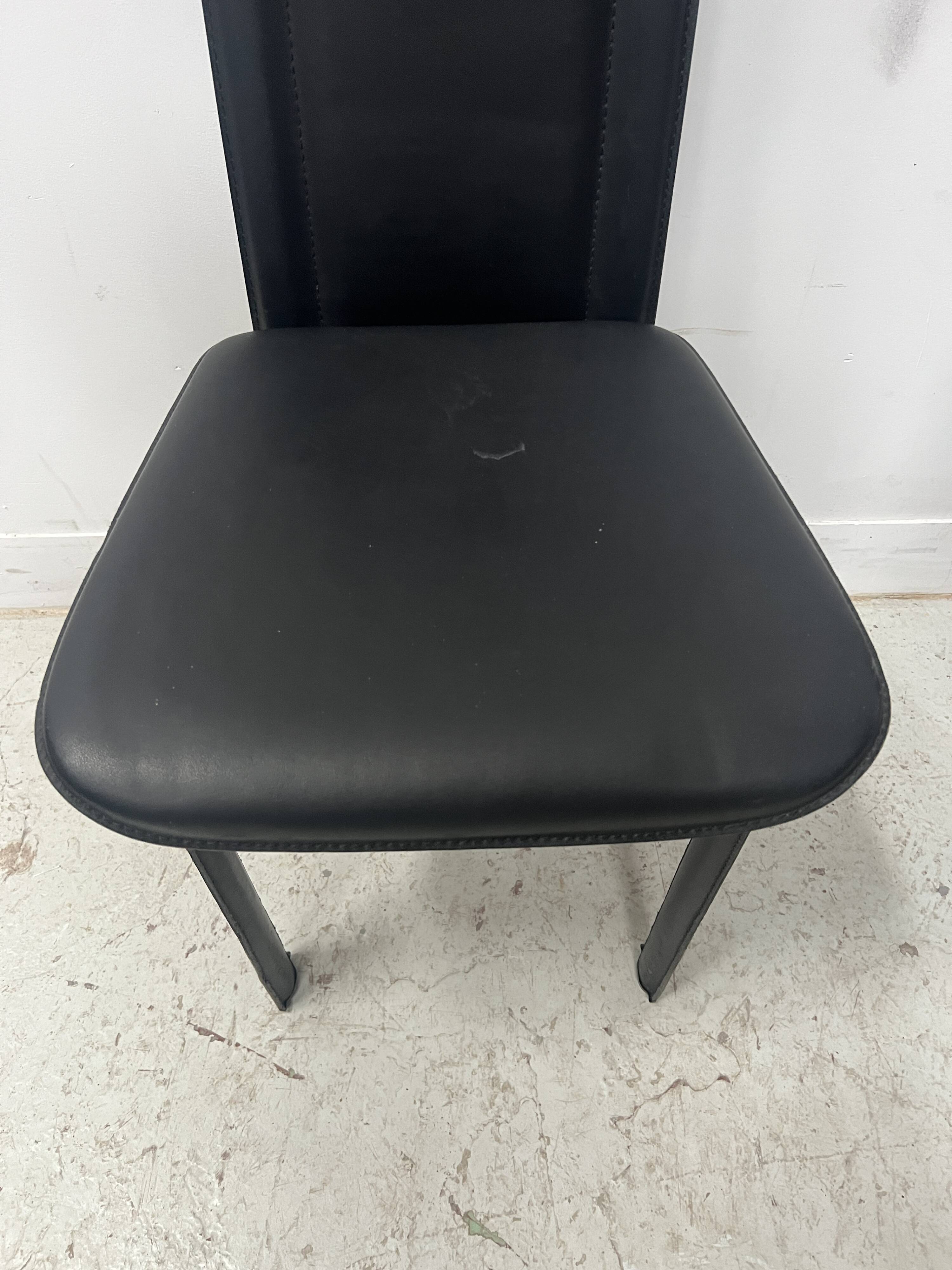 Set of eight designer chairs in black leather from the 20th century
