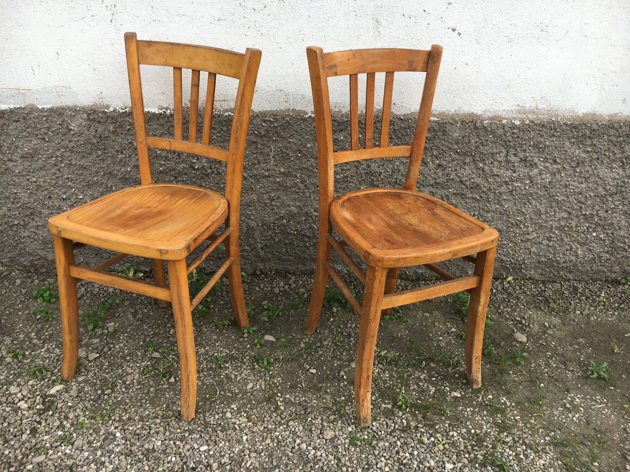 Pair of vintage curved wooden bistro chairs