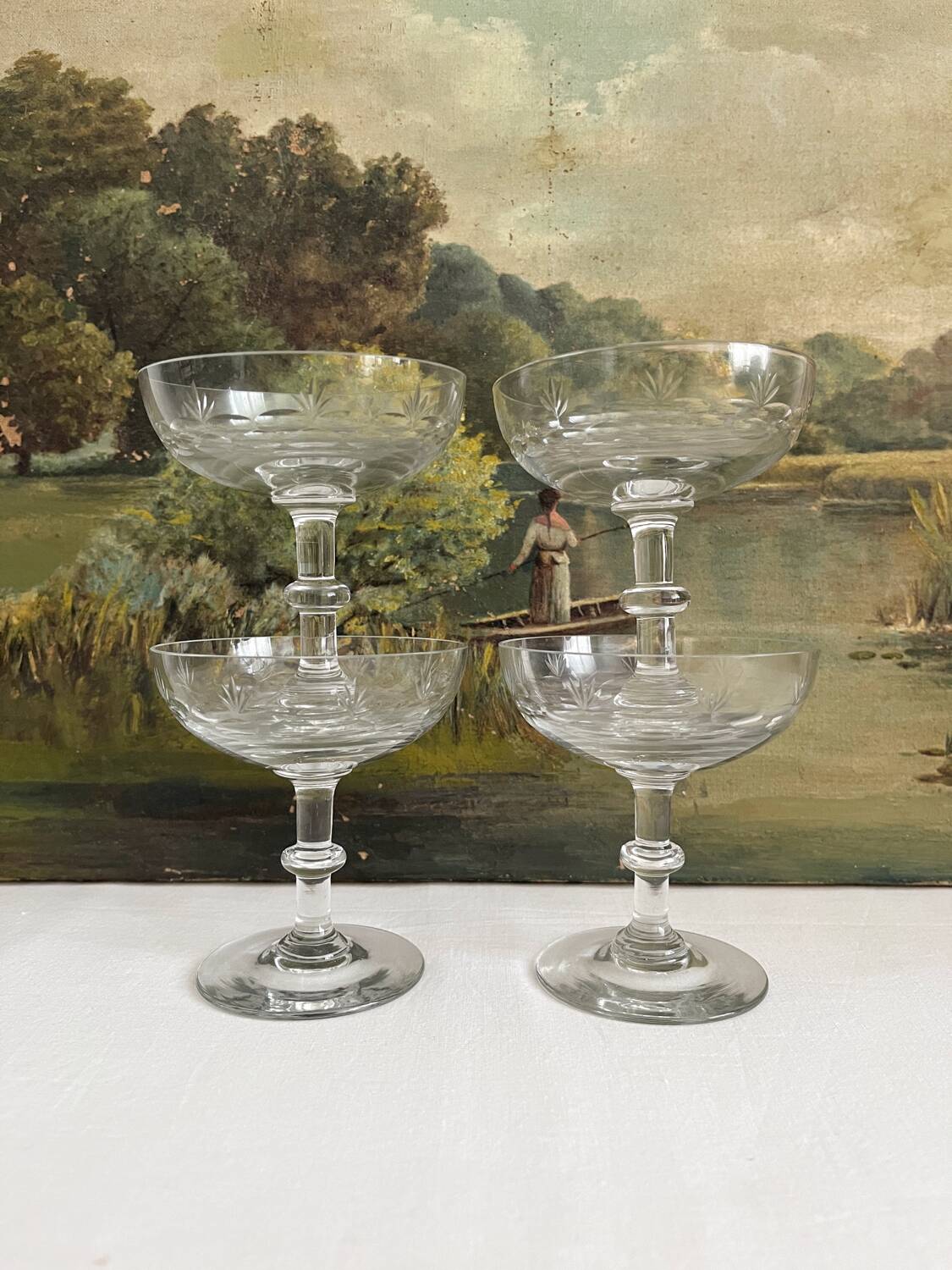 4 antique champagne glasses in engraved glass decor