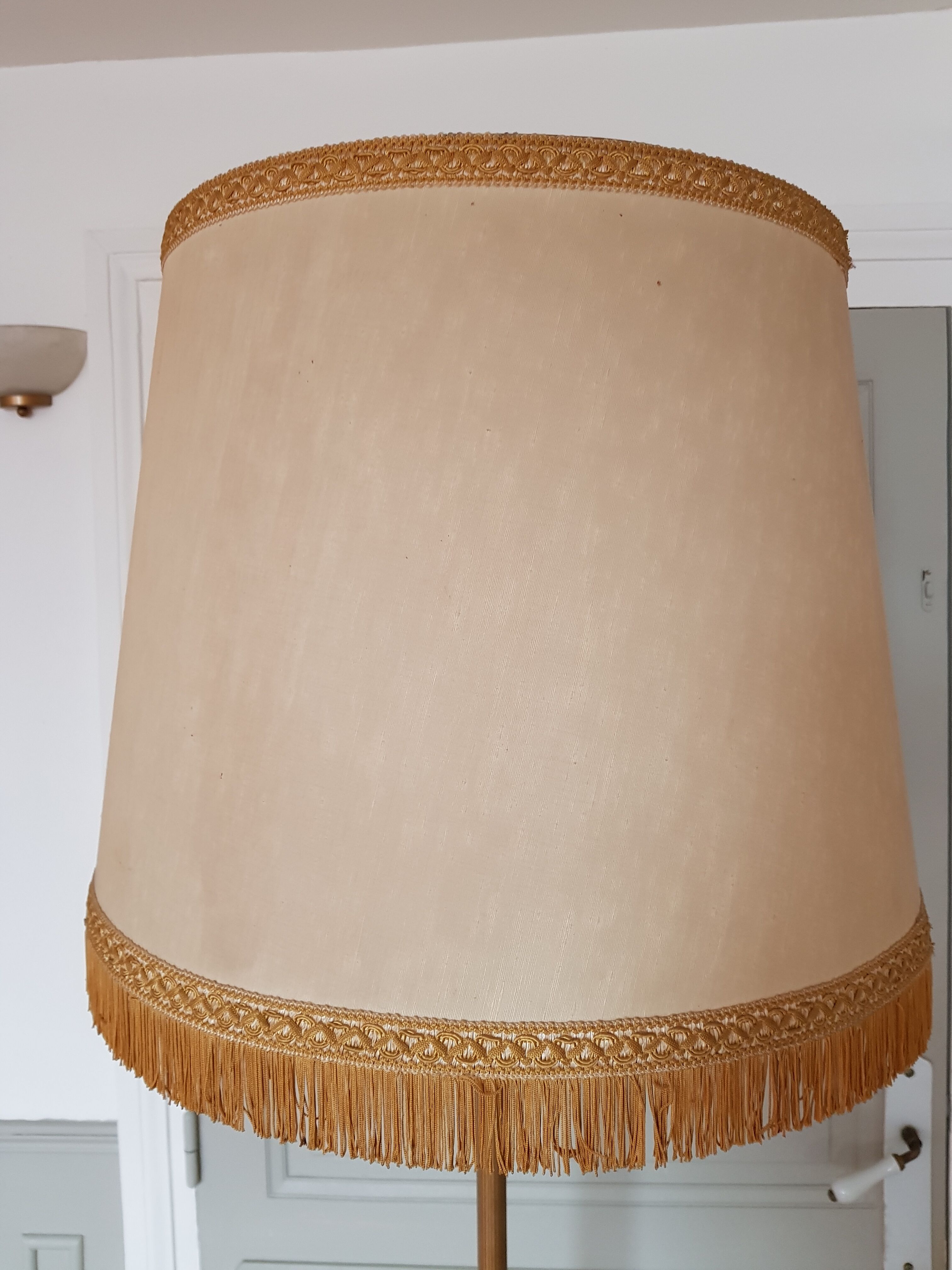 Authentic antique lamppost in gilded brass lampshade in fringed cream fabric
