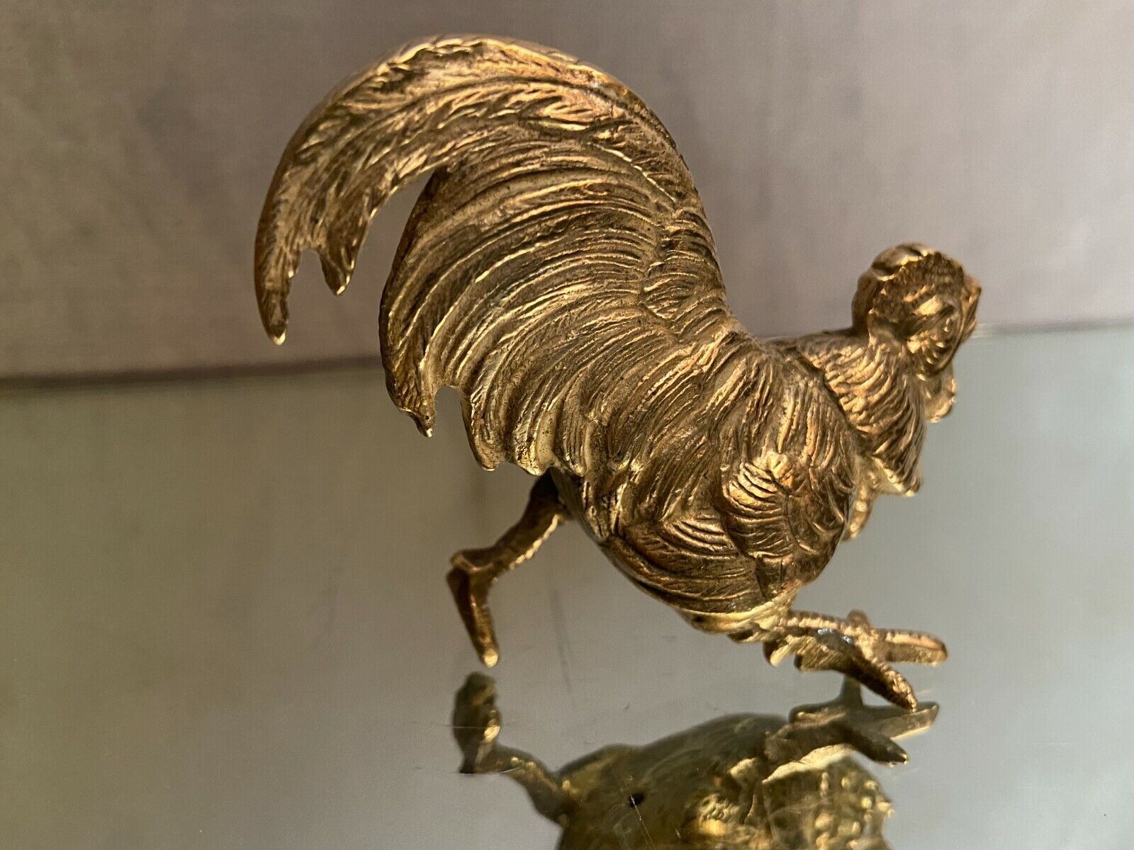 Subject to the silver metal rooster