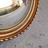 Witch mirror in gilded wood 24x24cm