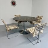 Old marble dining table with metal tulip base from the Italian design in the 60s