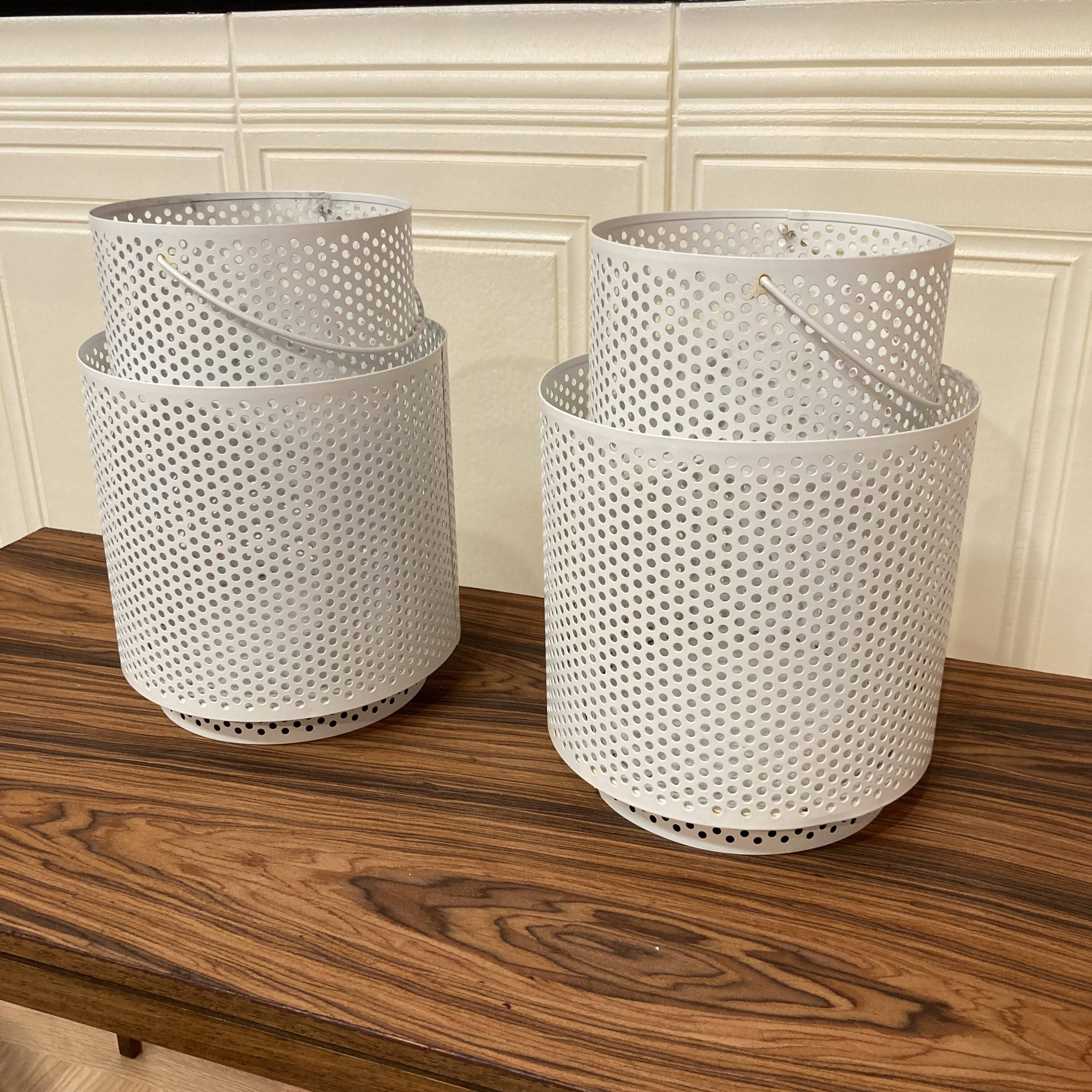 Set of 2 large metal candle holders in scandinavian design.