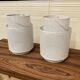 Set of 2 large metal candle holders in scandinavian design.
