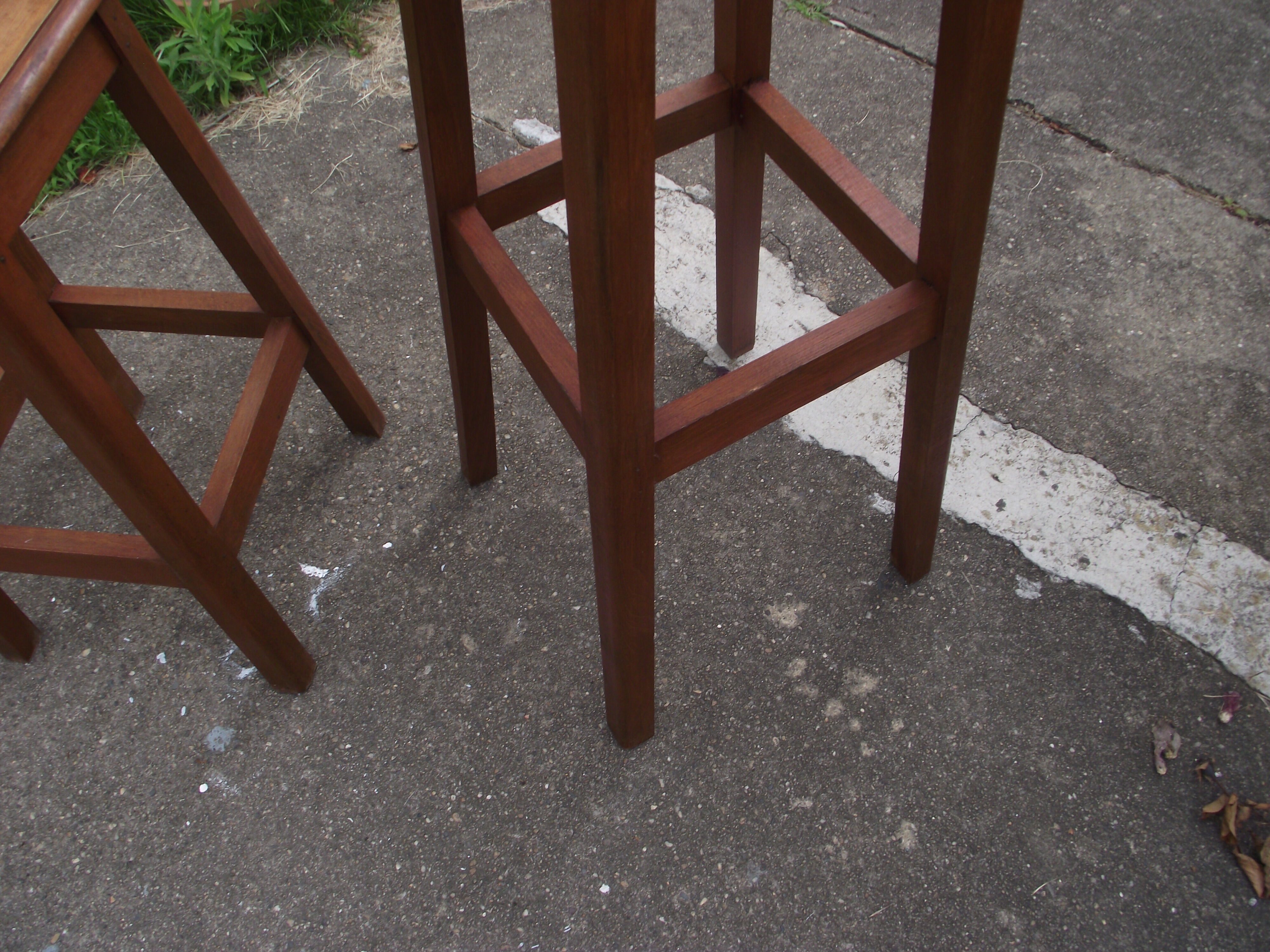 Two wooden artist stools in the early 20th century