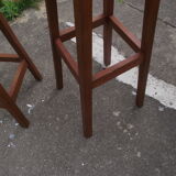 Two wooden artist stools in the early 20th century