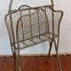 Brass magazine rack in neo-classical style, 20th century.