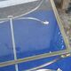 Coffee table in brass and brushed iron