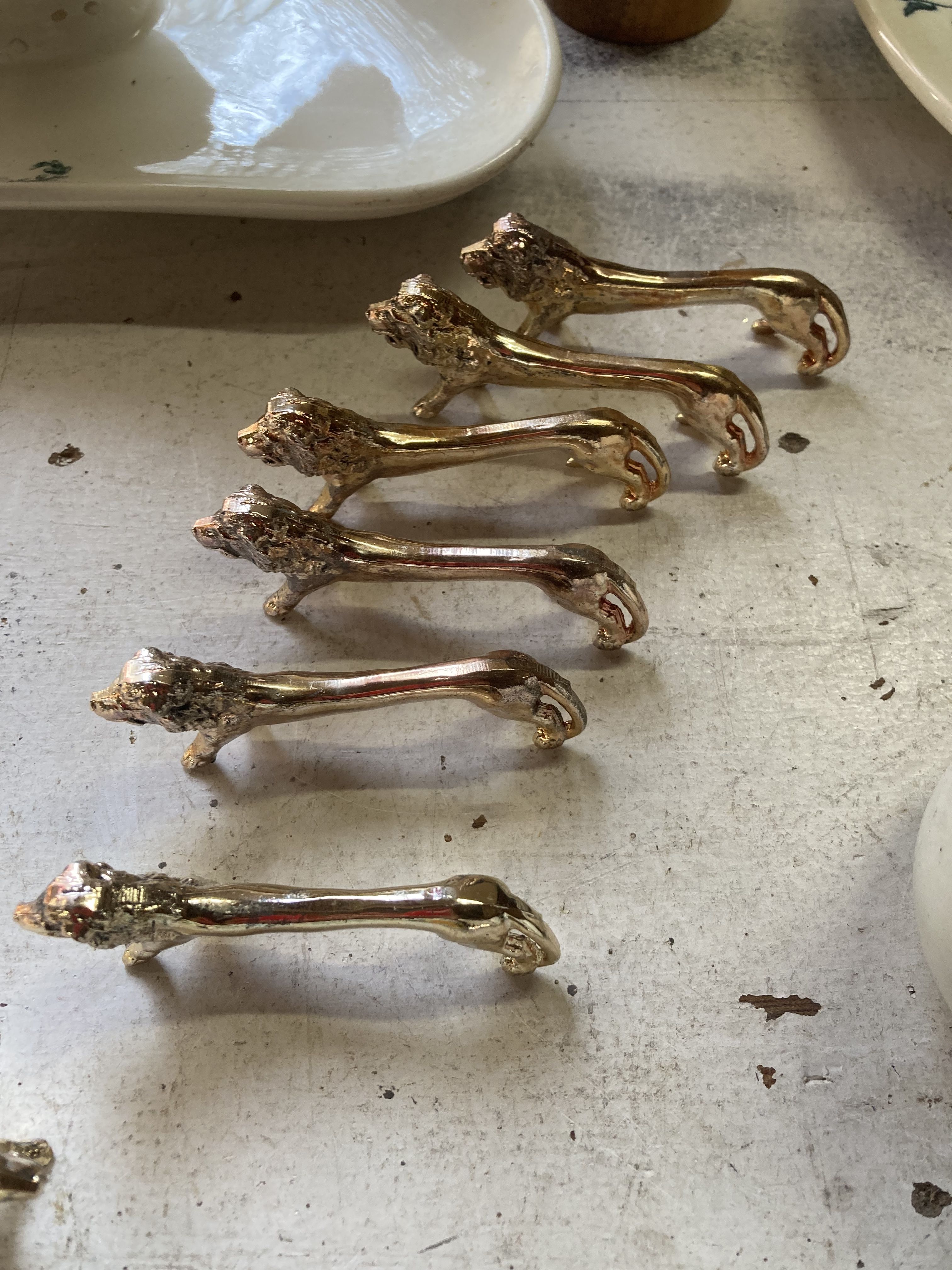 12 vintage gilded gold metal lion animal knife holders