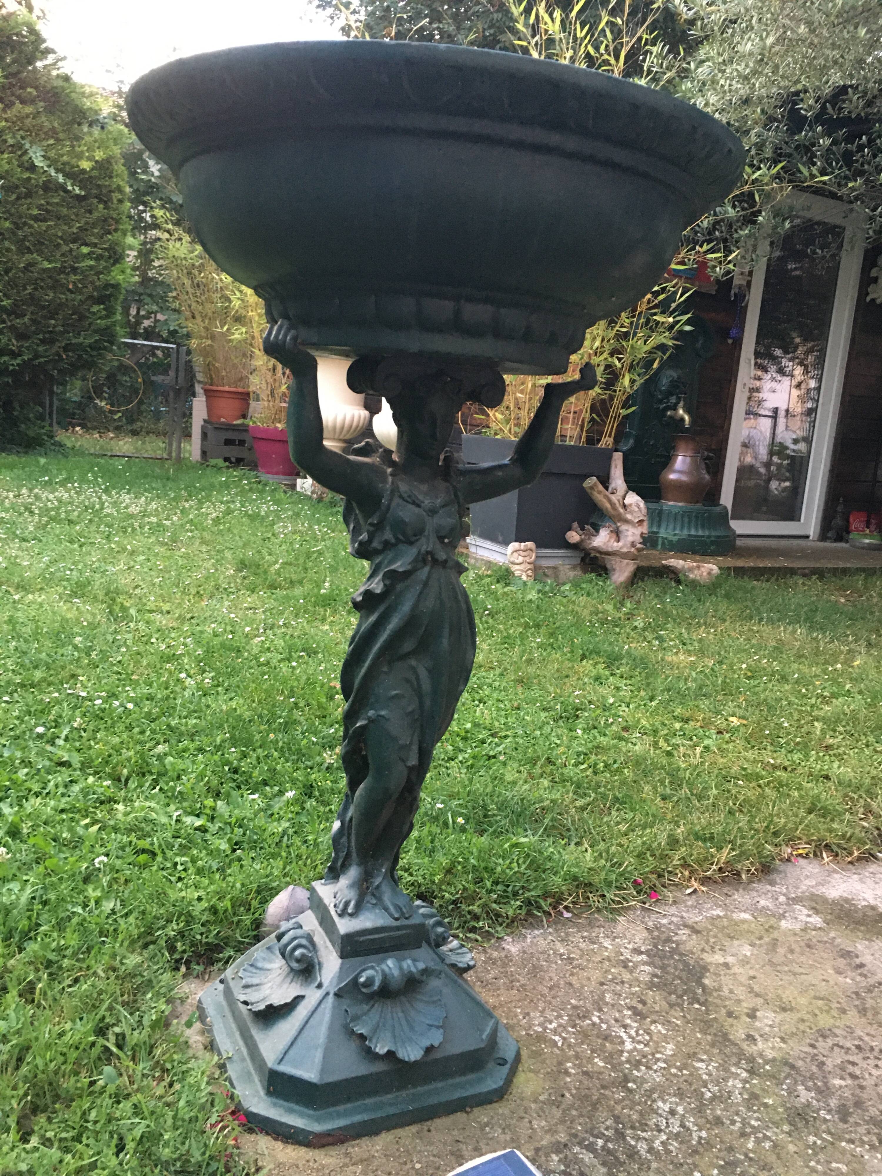 Cast iron caryatid fountain