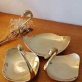 Empty brass swan pocket