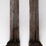 Pair of ancient cast iron chenets adorned with bust of Marianne